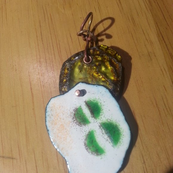 Enamel work and a recycled bottle cap 