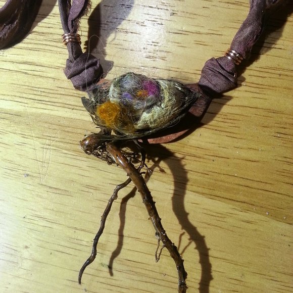 Resin pod with embedded fibers on copper 
