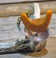 Adjustable base metal ring with orange tagua nut