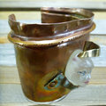 Resin face fold formed cuff bracelet with green patina