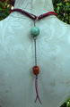 Looking glass mannequin bust steel wire red suede necklace