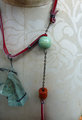Looking glass mannequin bust steel wire red suede necklace
