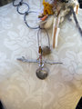 industrial necklace with steel links and organic embellishments
