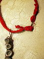 Concrete octopus necklace with recycled red cord