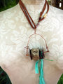 Concrete vertebrae necklace with found objects