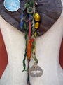Gathered brown leather fringe bib necklace with blue capiz shell