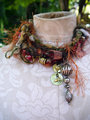 Yarn fringe mixed media charm necklace