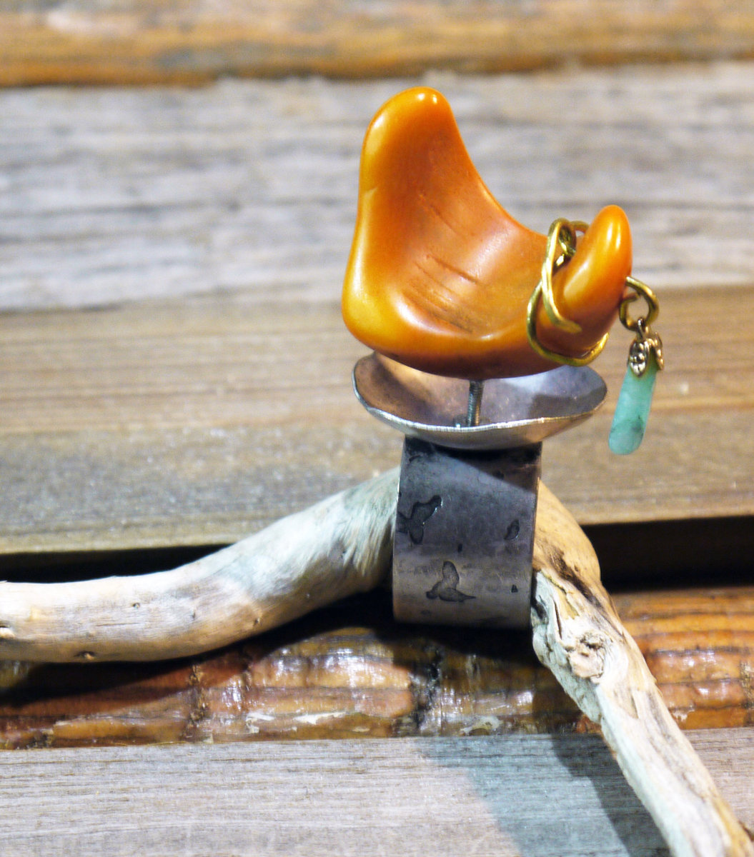 Adjustable base metal ring with orange tagua nut