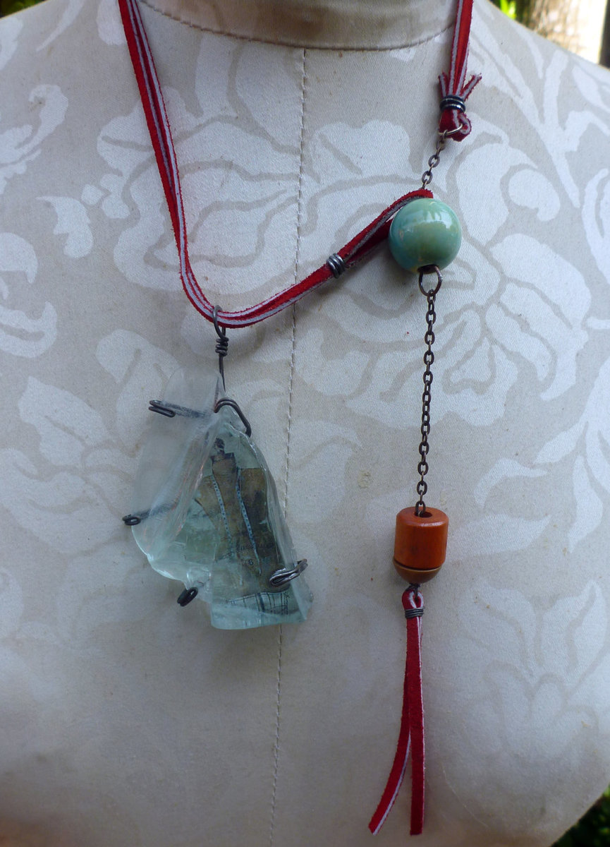 Looking glass mannequin bust steel wire red suede necklace