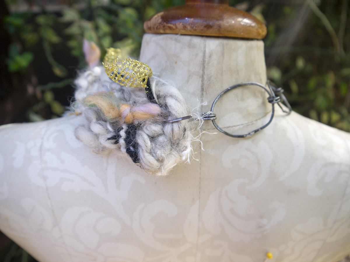Abstract yarn necklace with steel links and organic embellishments