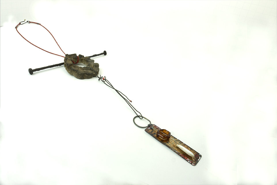 Concrete choya disc with dangling enamel charm