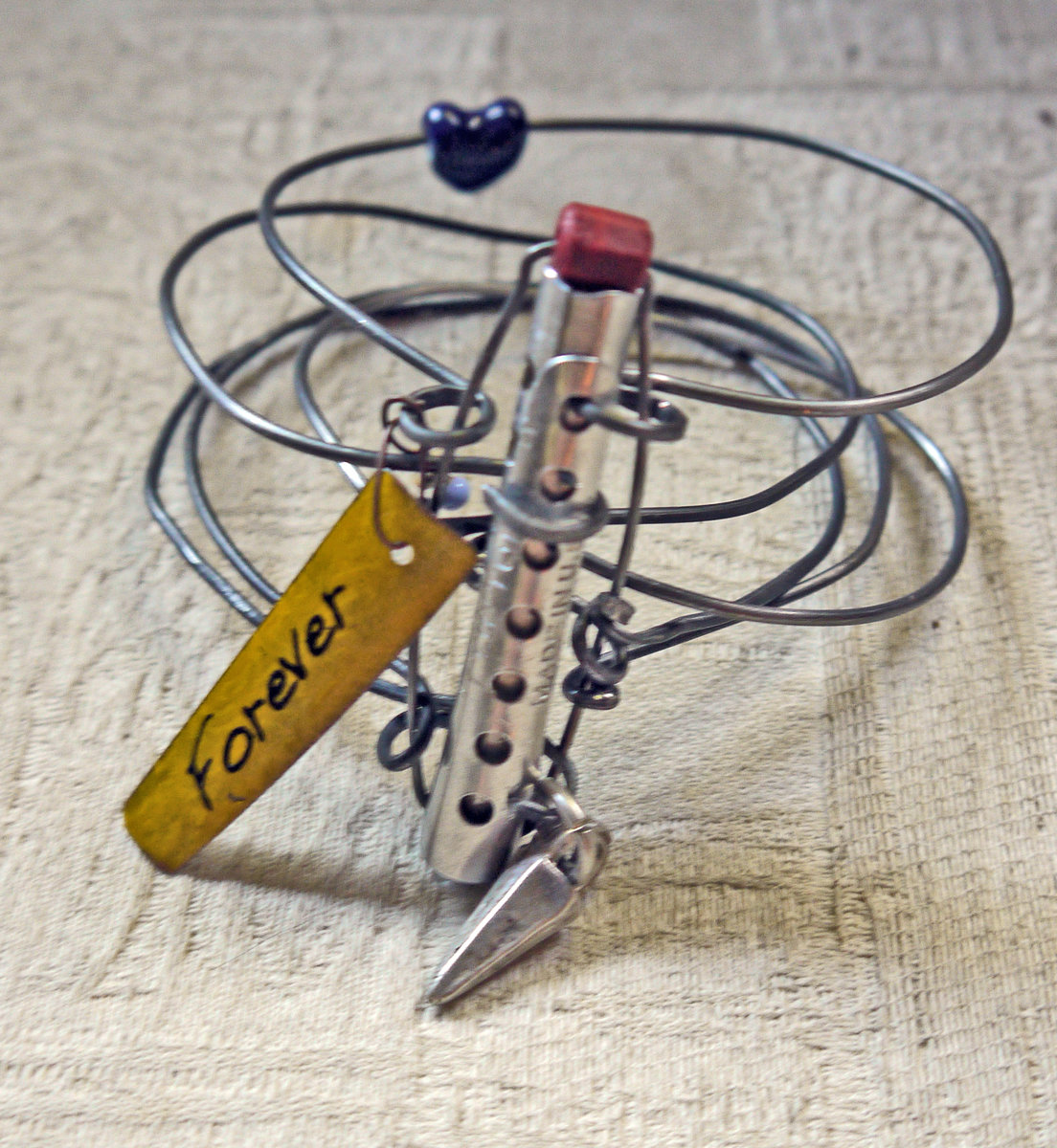 Vintage hair roller forever steel bracelet